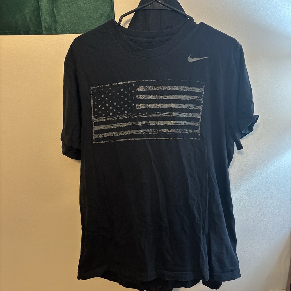 Nike Black Short Sleeve Tee with Subtle Flag Design
